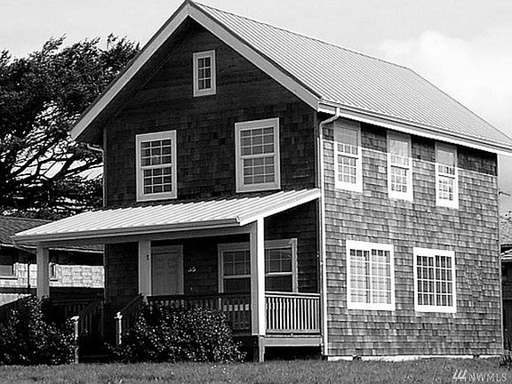 Photo is of a similar house to plans. 