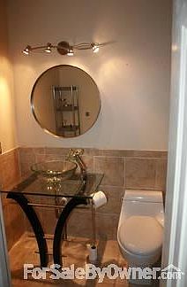 Downstairs bathroom
						:
						bathrooms are renovated glass vessel sinks and heated floor . large shower.