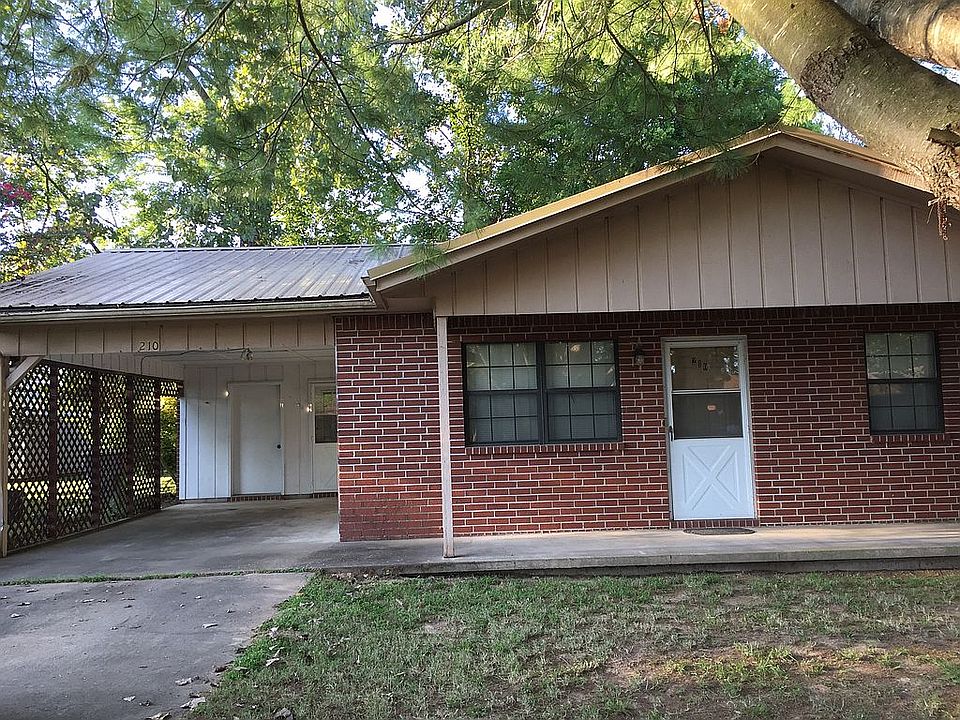 Brick home with metal roof 