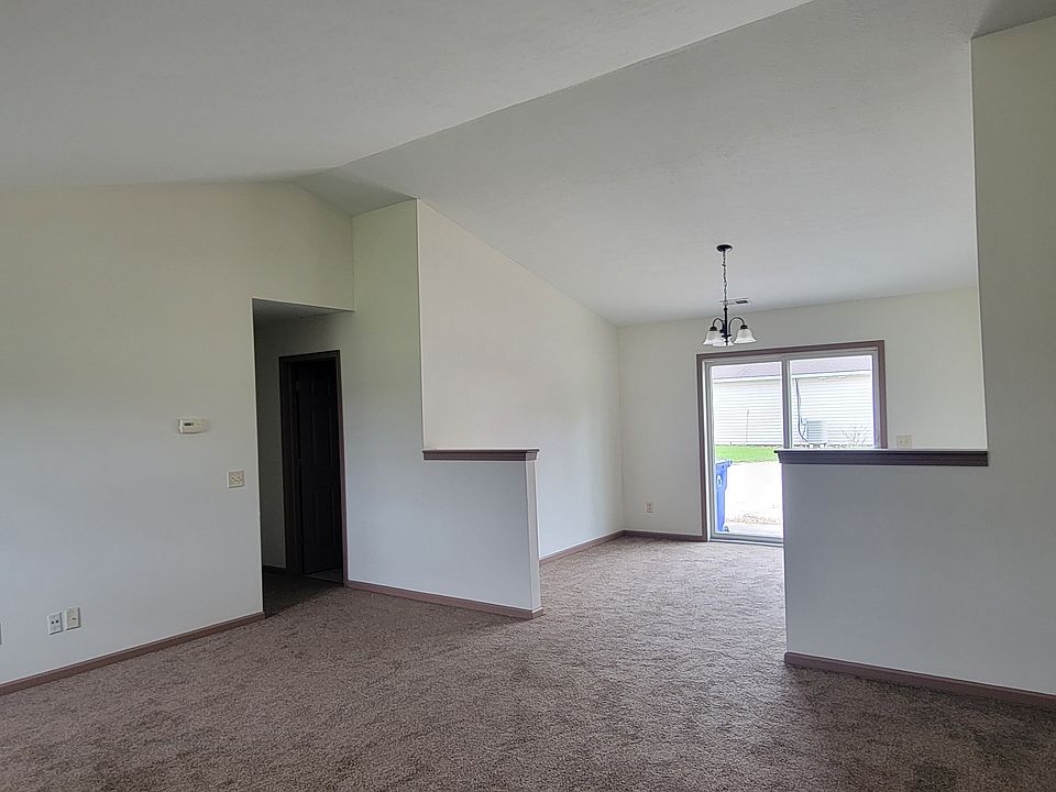 Living room and family room with cathedra ceilings