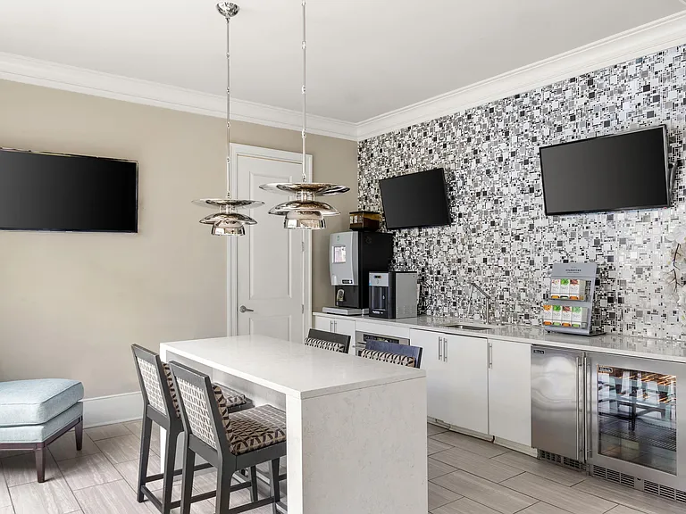 Step into a chic kitchen corner that blends modern design with functional elegance.