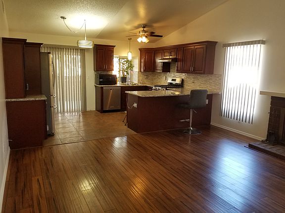 As you walk in to your new house from front door. Newly remodeled kitchen with stainless steel appliances. New blinds throughout. New hardware, fresh paint.