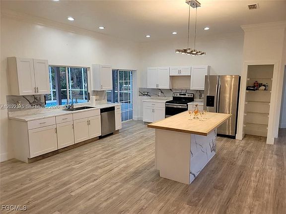 5th image of 7820 N Rich Rd