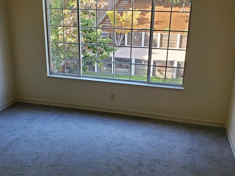 primary bedroom view towards backyard