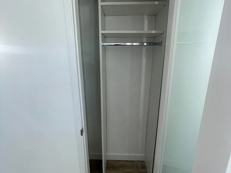 Extra closet off hallway. Great for brooms and general storage.