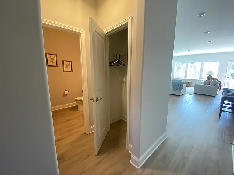 Main floor guest coat closet and 1/2 bath.