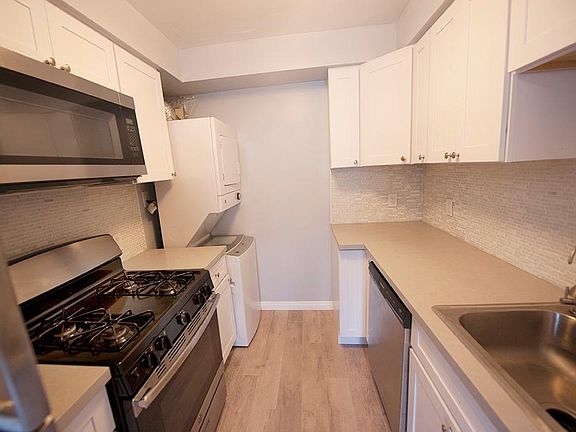 Brand new kitchen with high end appliances including a dishwasher, washer and dryer. Lots of cupboard space.