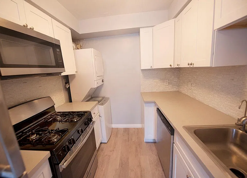 Brand new kitchen with high end appliances including a dishwasher, washer and dryer. Lots of cupboard space.