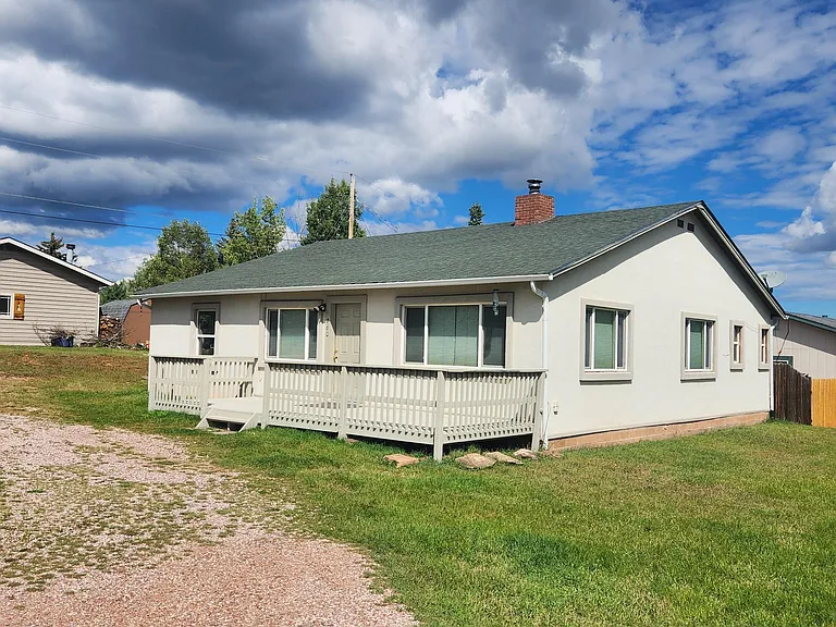 Front of home has a circular drive