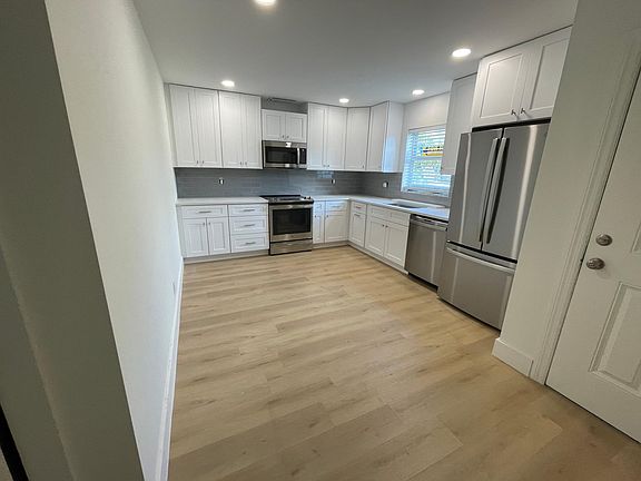 First floor enters into brand new kitchen with plenty of storage space! All appliances are brand new, the stove has air fryer and convection setttings.