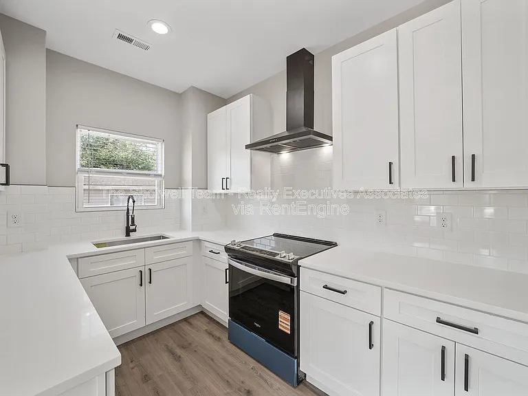 2711 Tarleton Ave — Photo 18