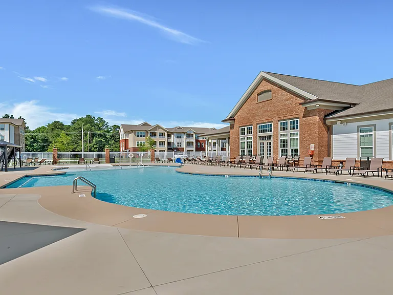 Enjoy premier amenities like a resort style pool with multiple cabanas and lounge chairs