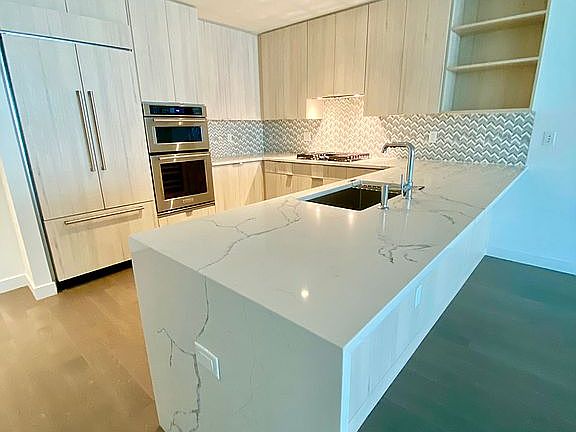 Waterfall countertops.