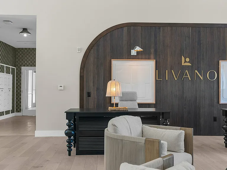Experience luxury and style in this sophisticated apartment lobby.