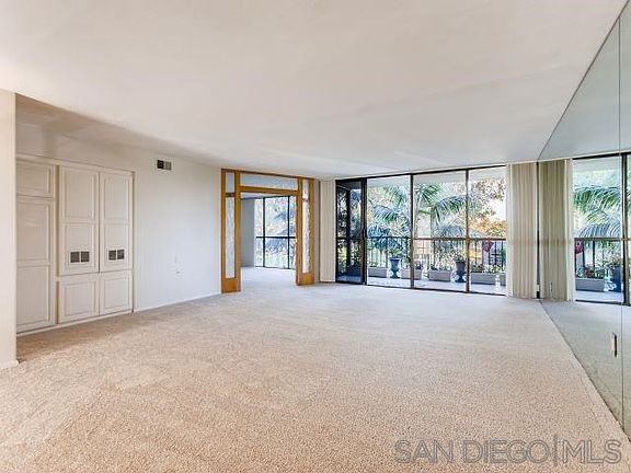 Wall of mirror gives lovely reflections of the greenery you have living directly across the street from Balboa Park