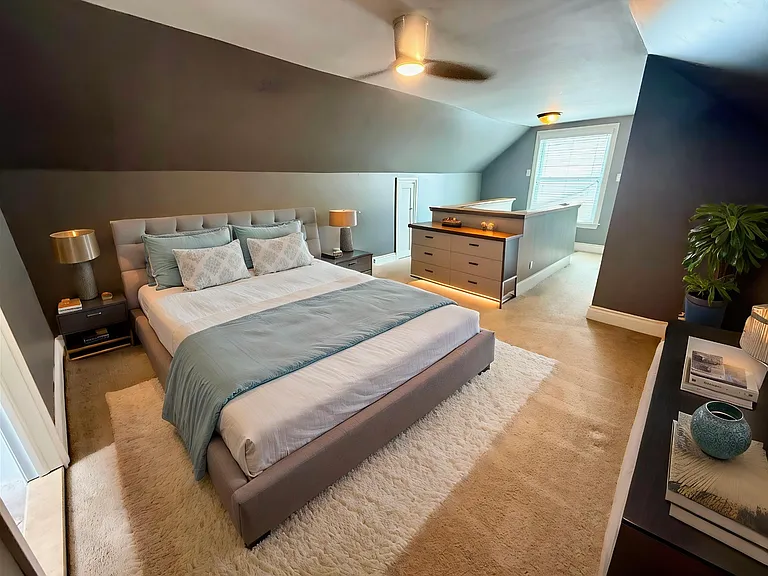 Primary bedroom on top floor with full bathroom