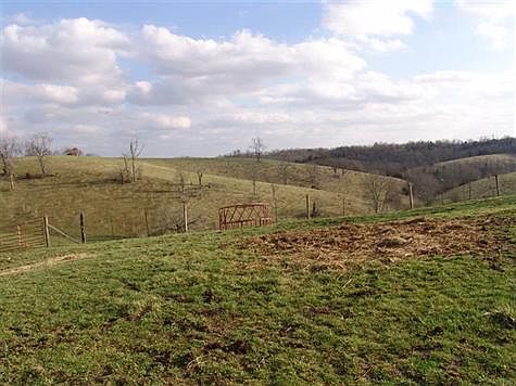 72 +/- acre good grazing farm with pond, city water, barn, and metal building. Has lots of road frontage and a creek that runs through the property.  Less than a mile off US 60.