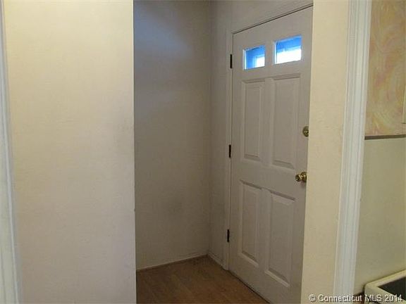 Entry with coat closet to l...
