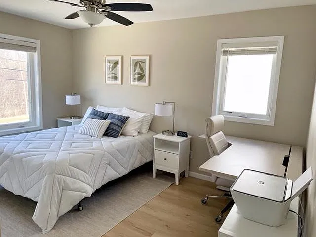 Bedroom 2 bed and workstation.