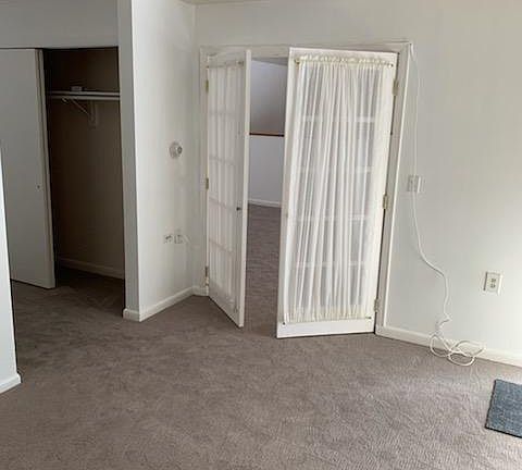 Bedroom showing closet