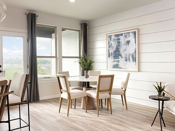 Dining Space with Backyard Patio Views