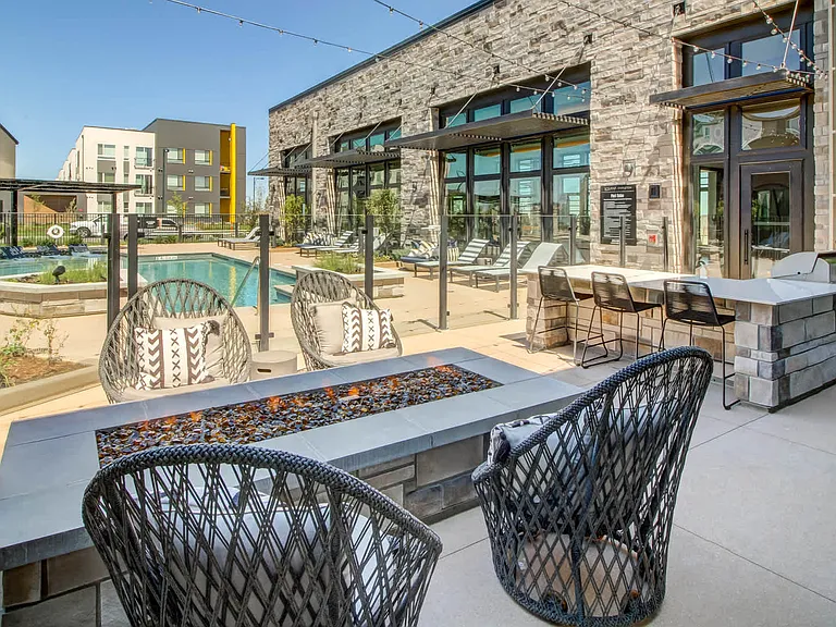 Outdoor Lounge with Fireplace and Grilling Area
