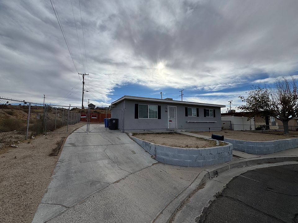 long driveway with large gate