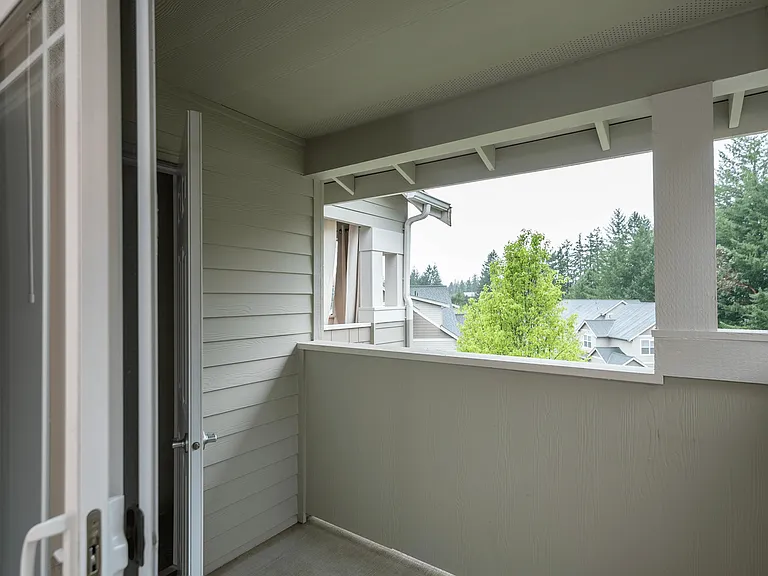 Indoor-outdoor living at its best! Step out from your spacious living room onto the balcony and take in the stunning natural greenery. The perfect spot to relax and unwind! Indoor-outdoor living at its best! Step out from your spacious living room onto th