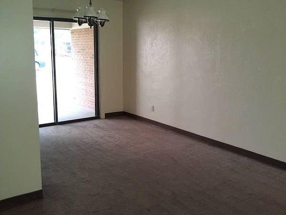 Dining room with sliding glass door.