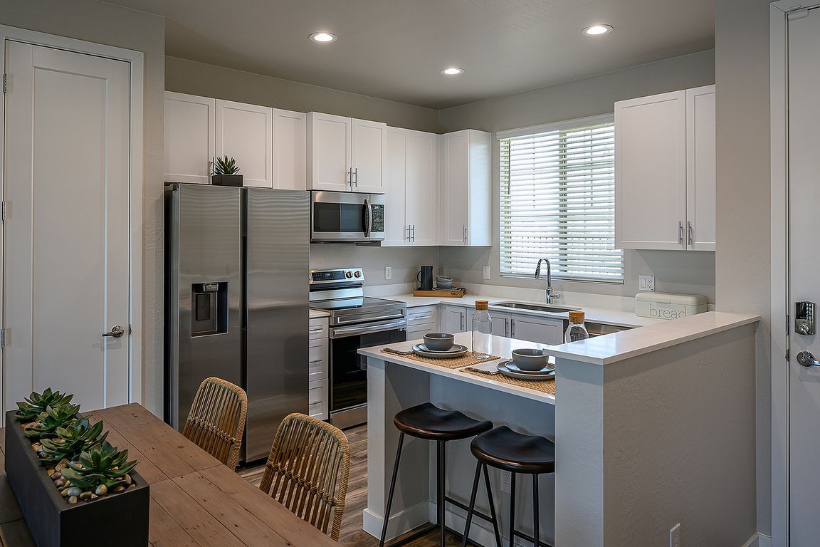 24-012-33 THE EMPIRE GROUP (Village at the BLVD) 2 bedroom model kitchen