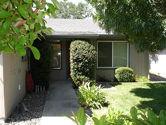 front view of walkway and house