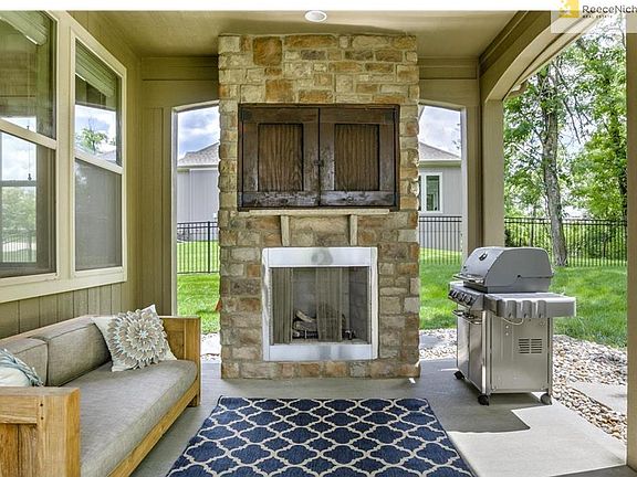 Outdoor living room... TV cabinet with fireplace
