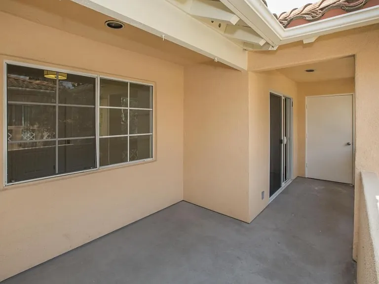 Back balcony, white door is a storage closet