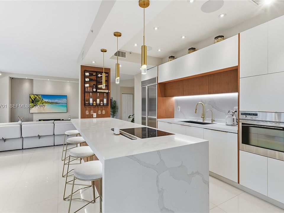 1st image of 3500 Mystic Pointe Dr APT 104