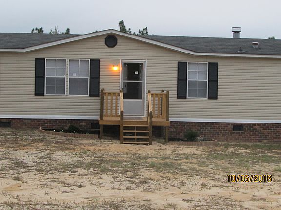 Flower beds bracket porch