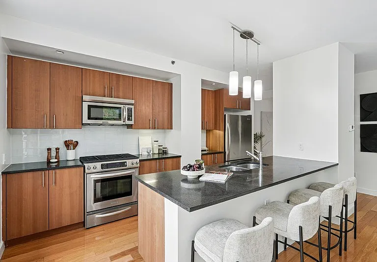 Transform your culinary adventures in Arbor's stunning kitchen, showcasing modern appliances and sleek finishes. This inviting space is perfect for entertaining or enjoying a quiet meal. Schedule a tour today to see it for yourself!