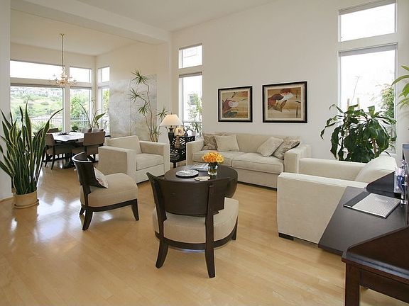 Soaring 20' ceiling, maple floors