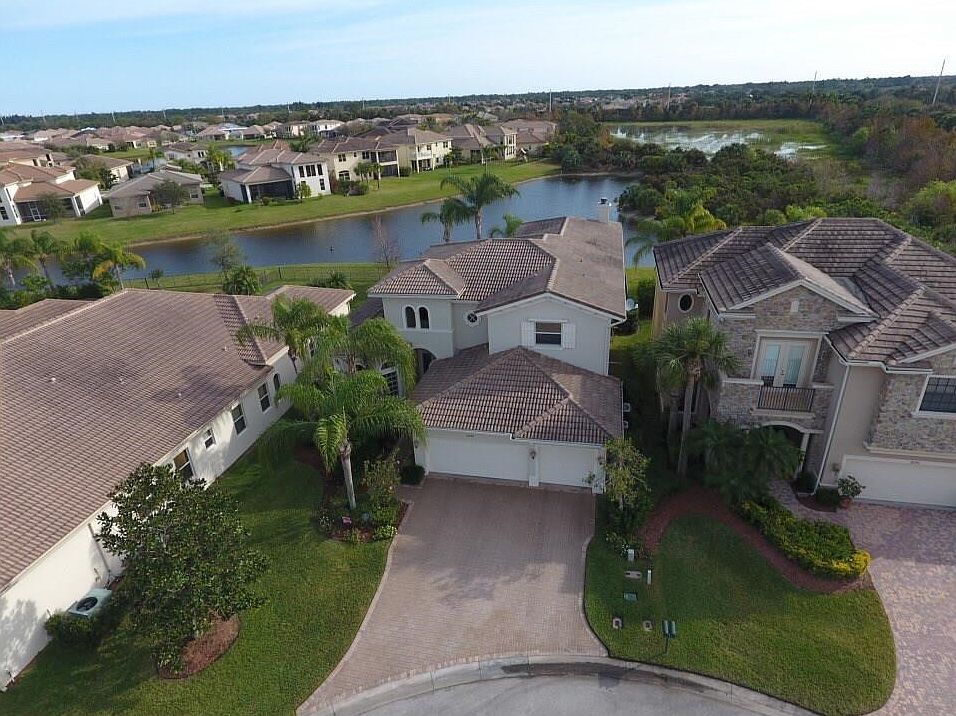 FRONT VIEW EAST WITH POND AND PRESERVE