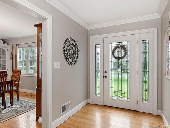 Elegant and welcoming foyer at the front of the home.