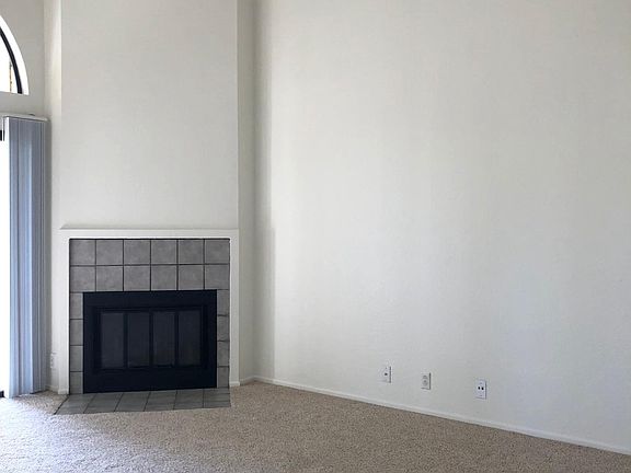 Living Room with Wood Burning Fireplace