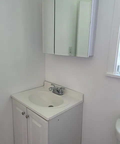 New Bathroom Flooring, Vanity, Sink, Medicine Cabinet