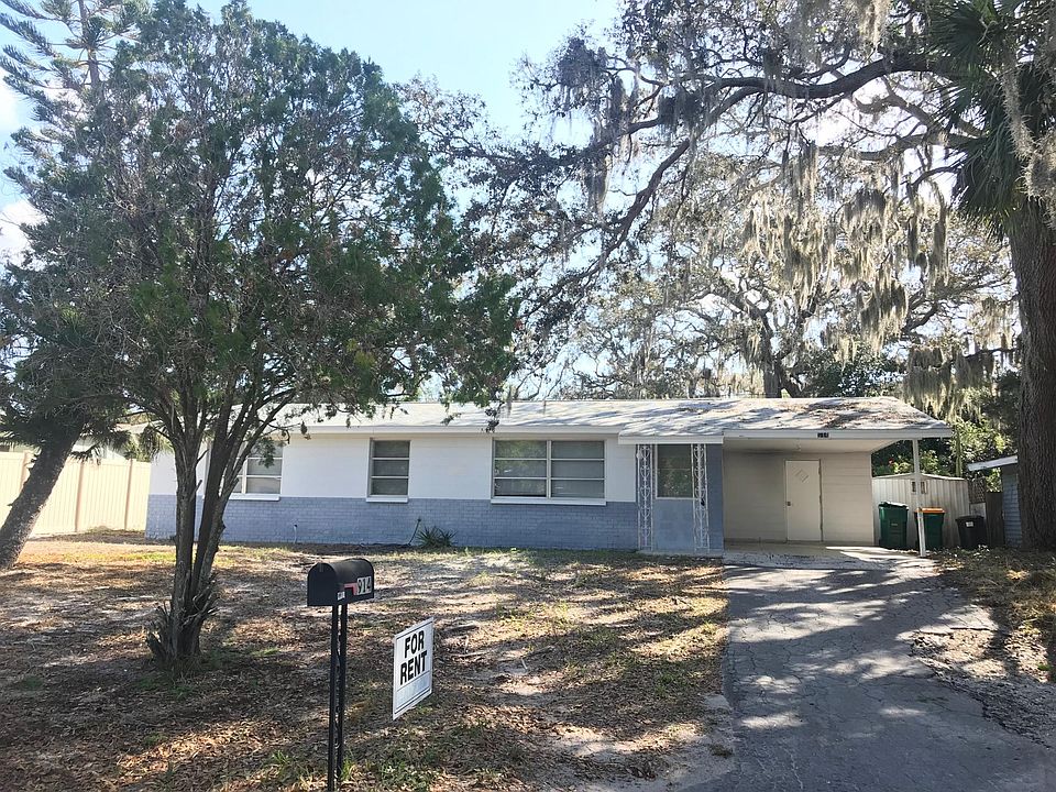 Shady front yard with one car carport & large laundry/ storage closet. New energy efficient roof.