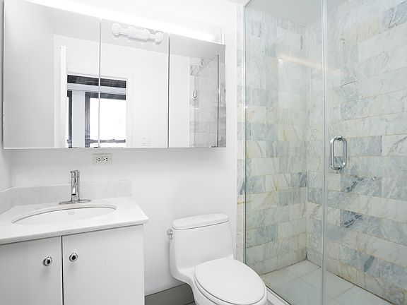 5th image of 329 E 9th St APT 2
