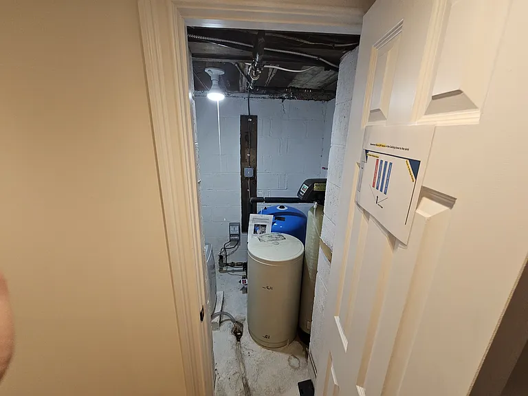 Basement
Right down the stairs from the kitchen, is the water system room.