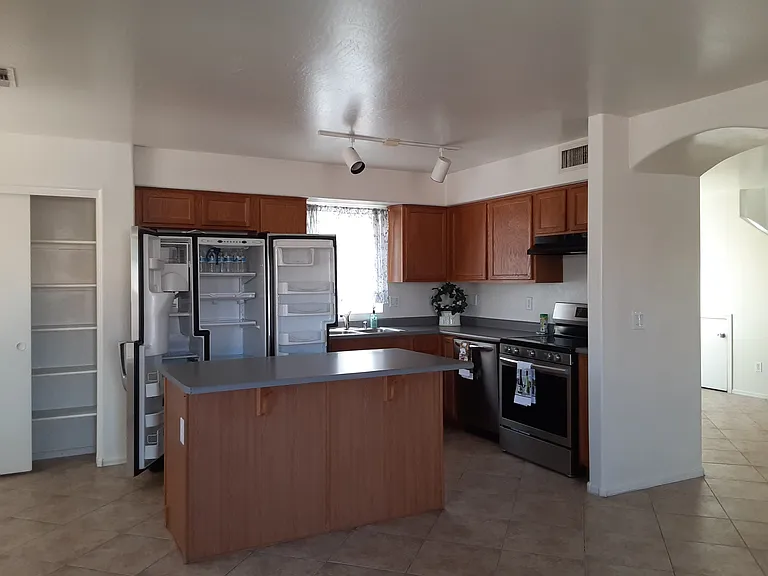 The Kitchen with new eletric stove and dishwasher and proffessional garbage disposal