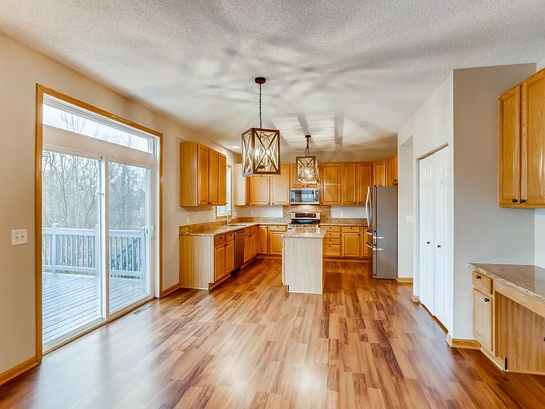 Informal dining looking to kitchen