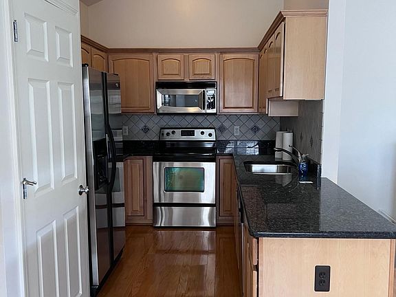 Stainless steel appliances and Granite Counter tops Kitchen