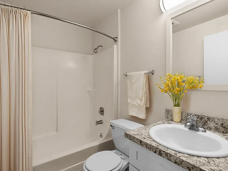 Step into comfort and style with this elegantly designed bathroom. Step into comfort and style with this elegantly designed bathroom.