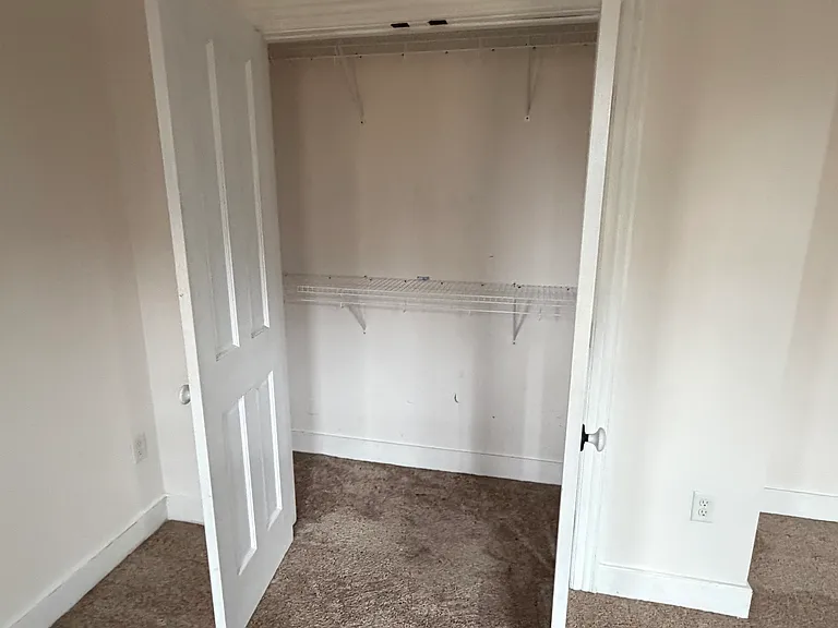Downstairs apt closet bedroom 1