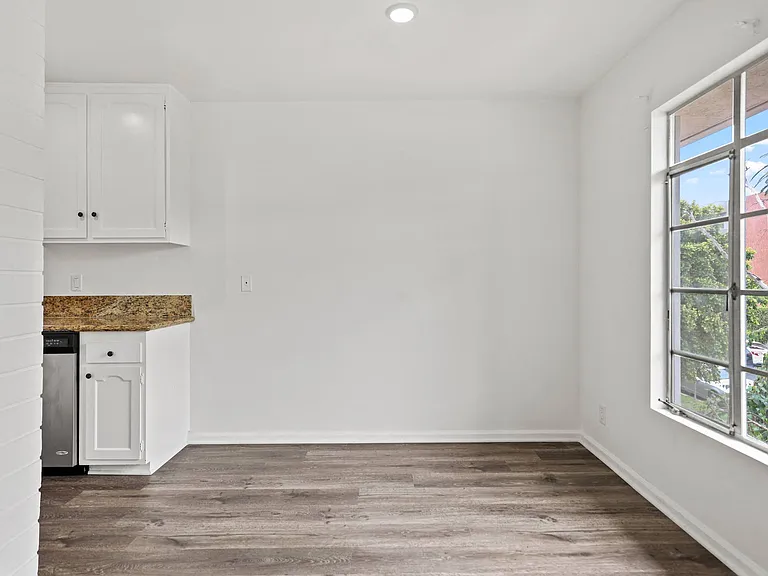 Kitchen and Dining Room with Large-Size Windows and Natural Light